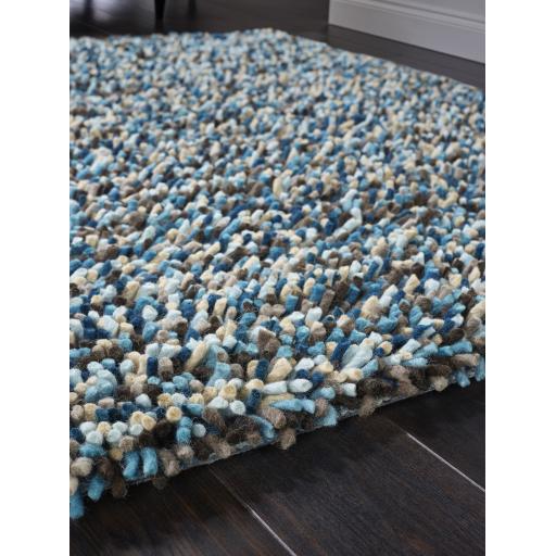 Rocks Shaggy Hand Woven Wool Long Pile Rugs in Grey, Ochre, Blue, Multi,  Pastel and Natural
