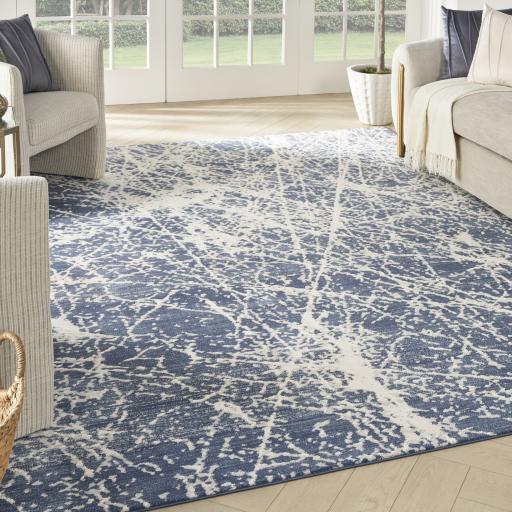 Exhale EXL02 Abstract Sprawling Pattern Rug in Navy Blue Ivory